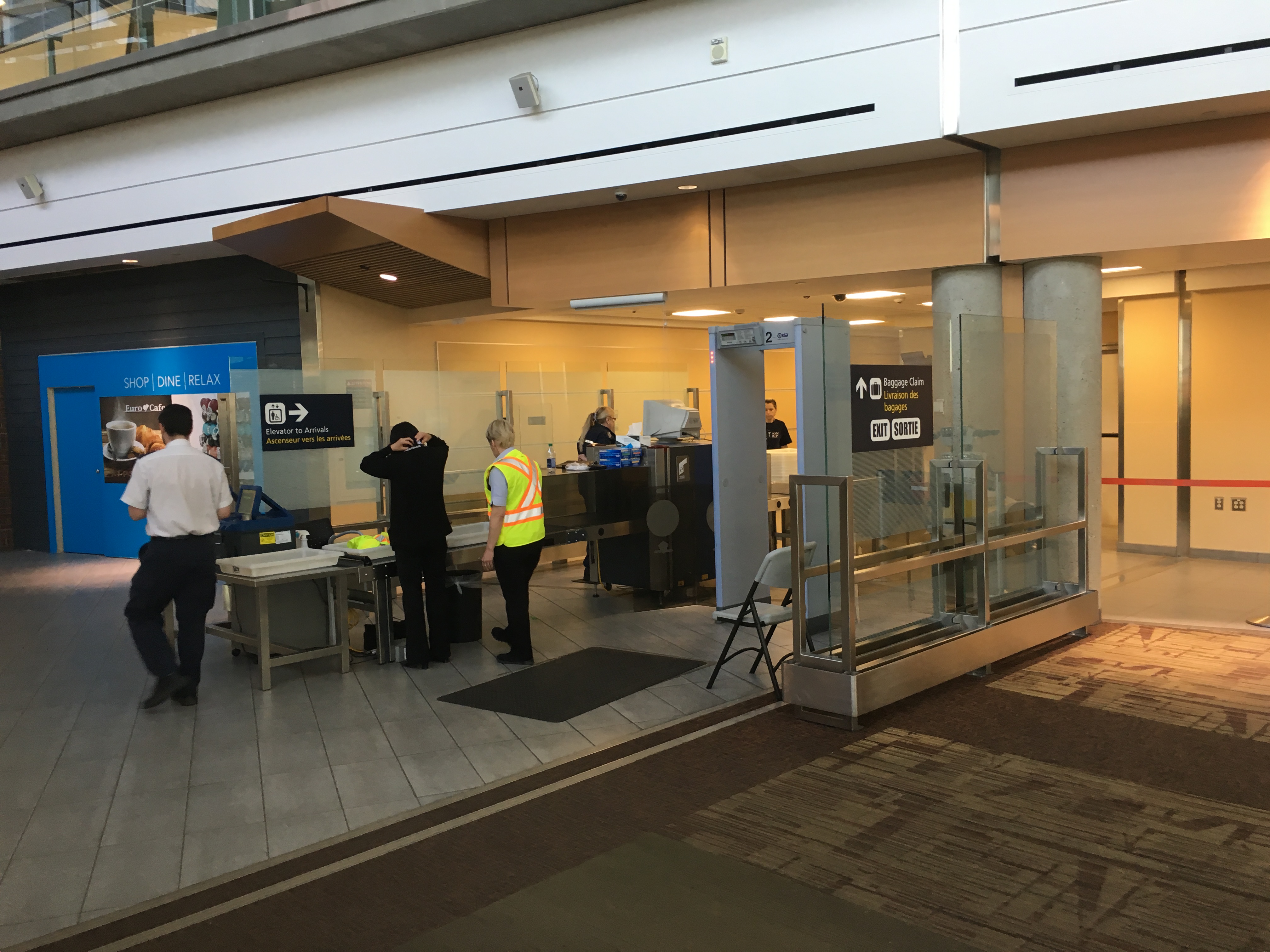 Security screening equipment at an airport checkpoint